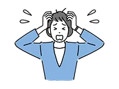頭を抱えている人物